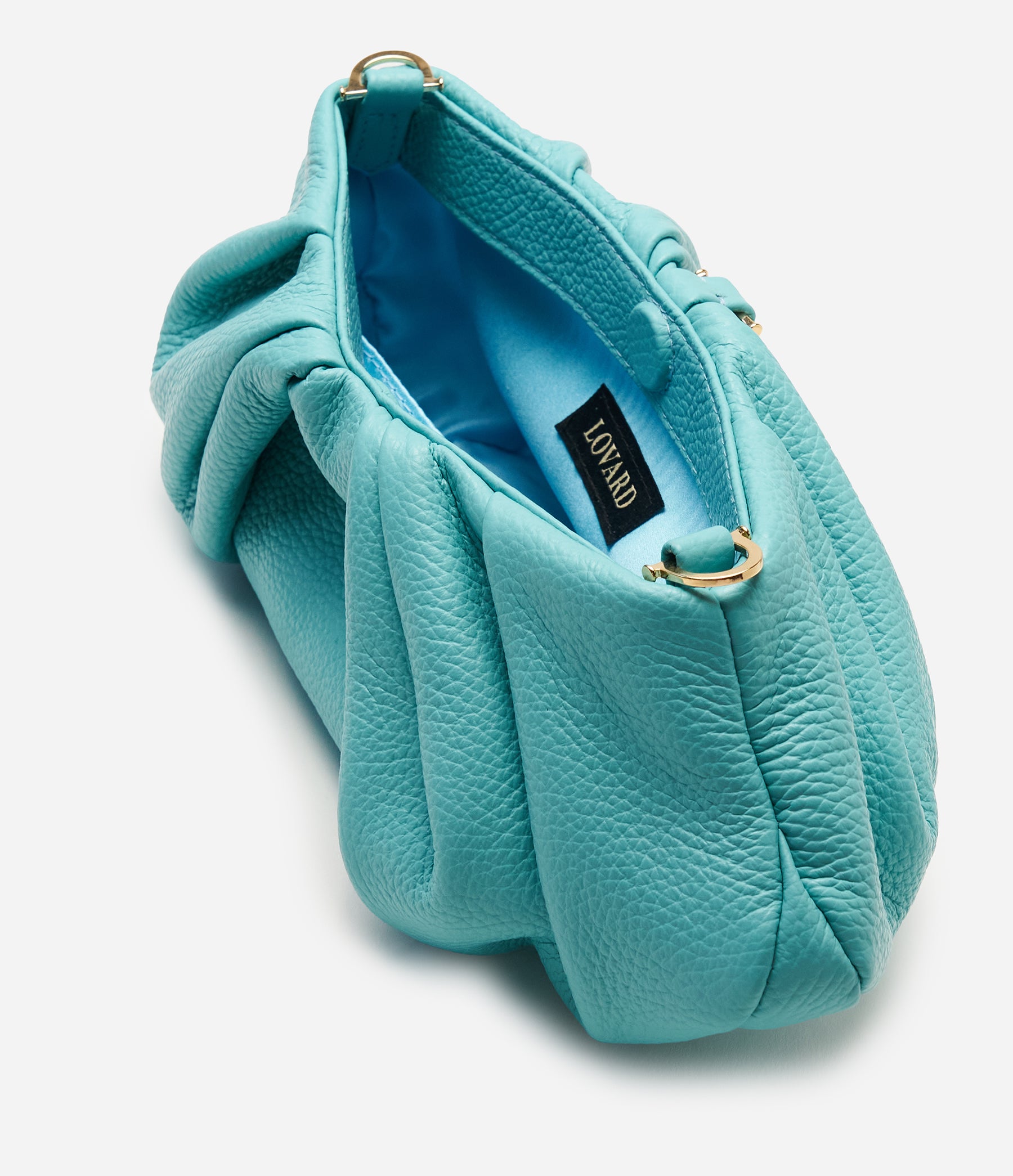 The Croissant in Lagoon Blue Leather with Gold Hardware